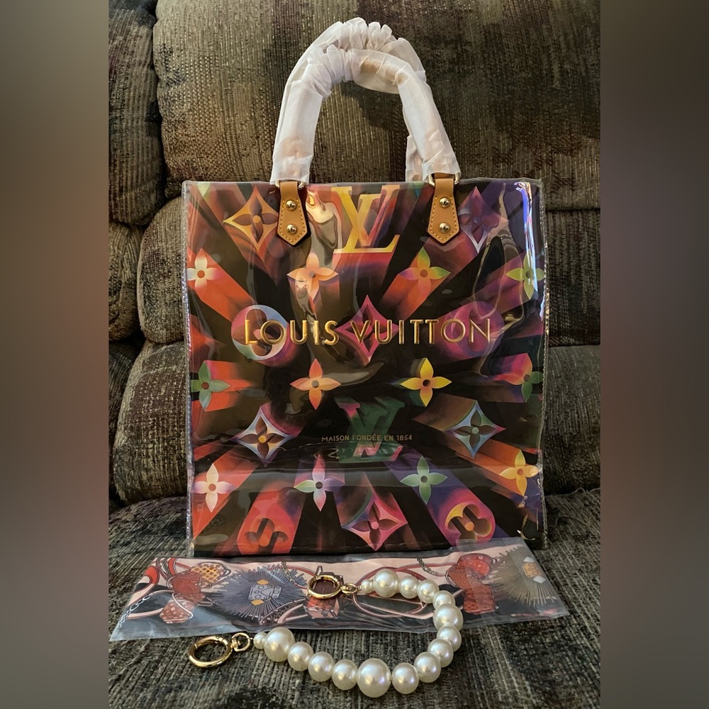 Upcycled shopping tote with accessories.